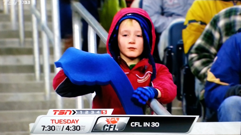 Actual TSN broadcast image of a ~9 year old Blue Bomber fan who has given up.